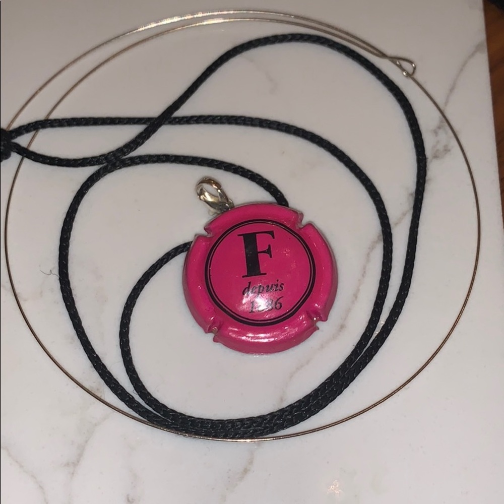 Champagne charm necklace black cord NWOT artistian